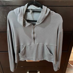 Vimmia brand womens sweatshirt. Size medium. Color gray. Quarter zip with pocket